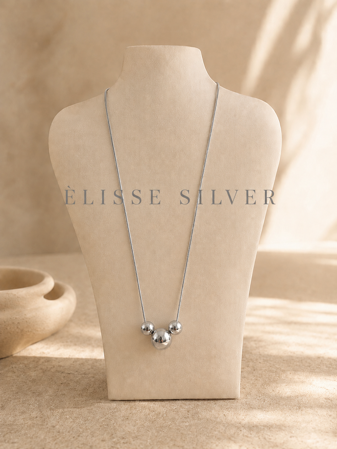 ÈLISSE NECKLACES